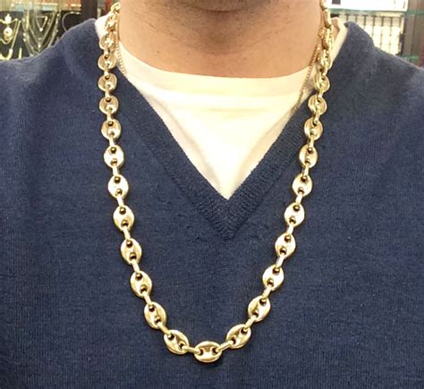 gold chain gucci on table|puffed Gucci link gold chain.